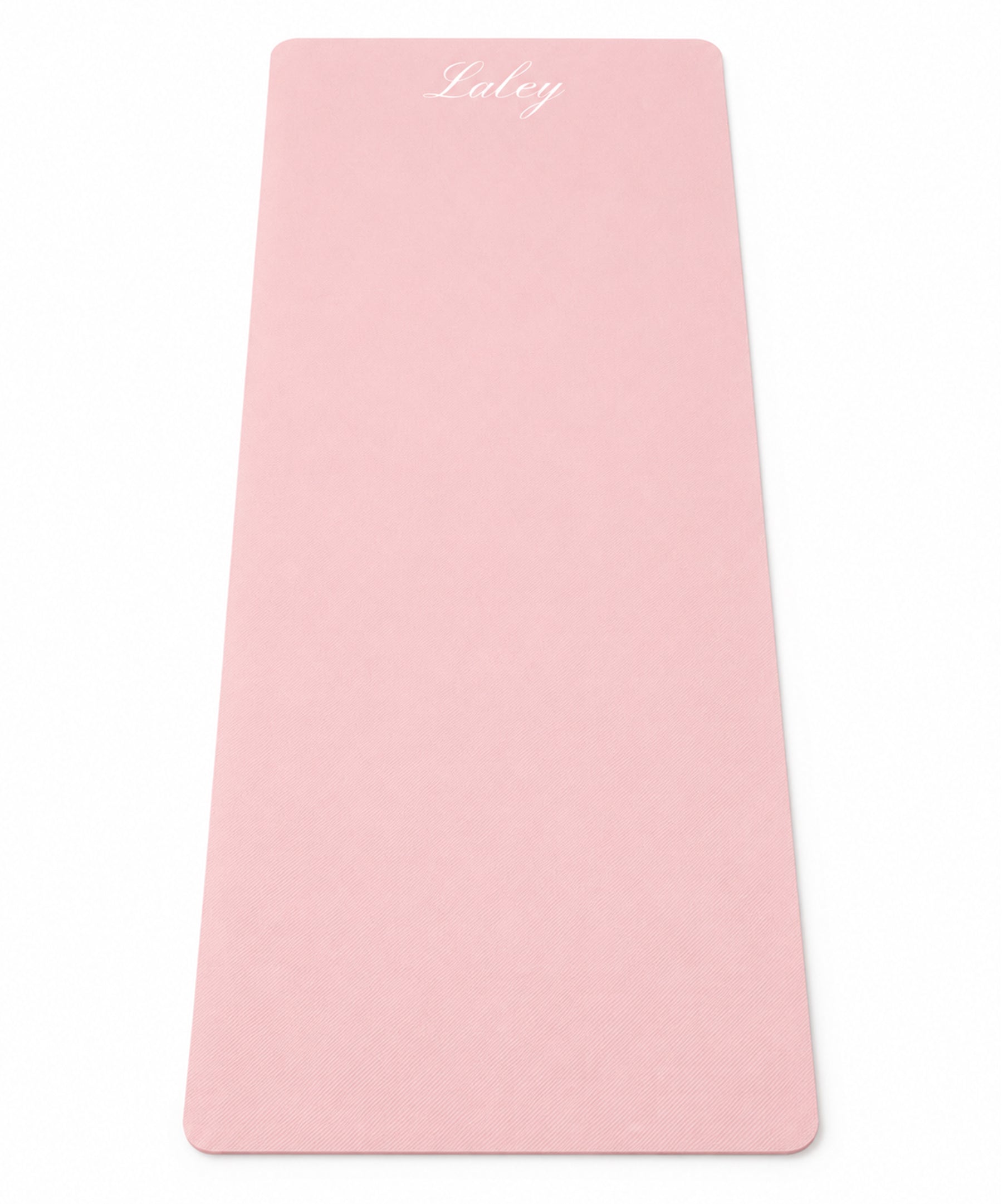 Packshot: Laley Grip treningsmatte rosa, utrullet på hvit bakgrunn.