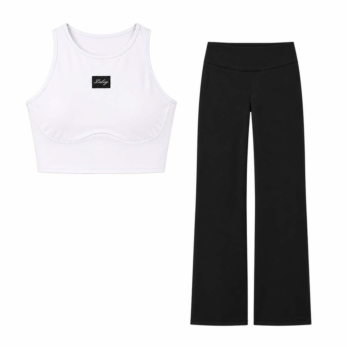 Packshot: Cut out treningstopp hvit og Straight pants svart, samlet treningssett på hvit bakgrunn.